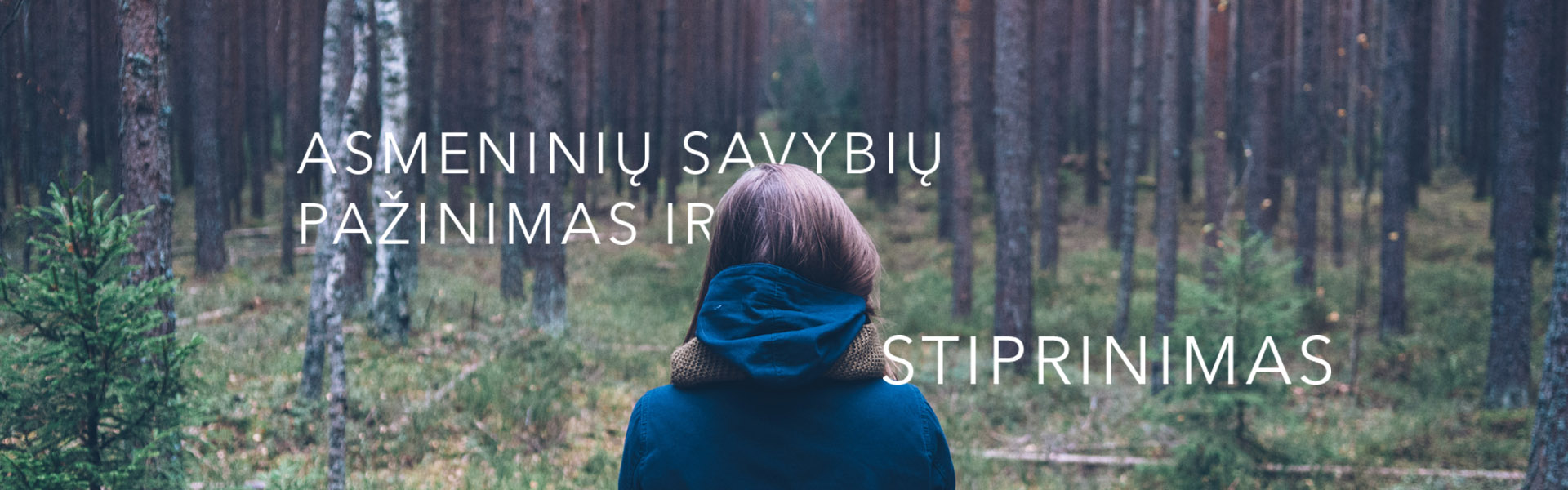 woman_standing_back_in _the_forrest